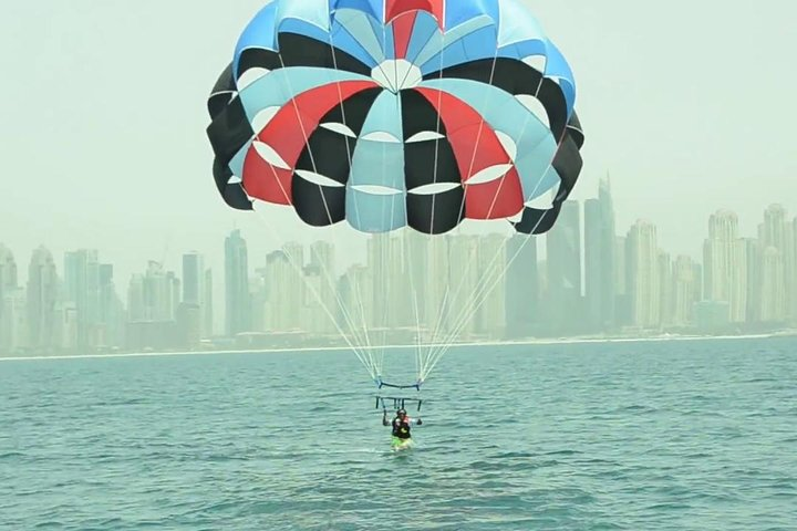 Soar high above Dubai's skyline while experiencing the joy of parasailing. Revel in breathtaking views and the sensation of floating gracefully over the shimmering Gulf waters.